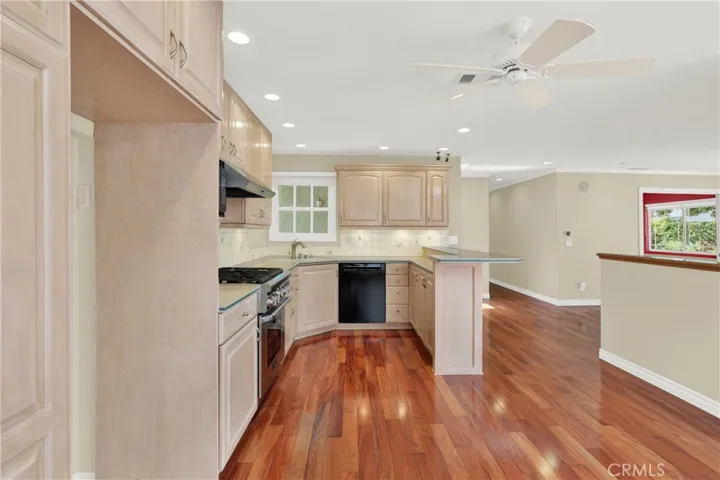 Lots of cabinets in the kitchen and a breakfast bar
