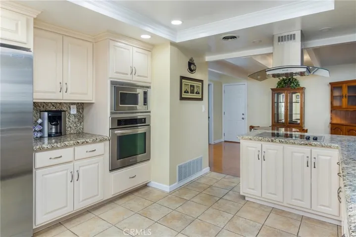Stainless steel appliances with built in coffee bar station