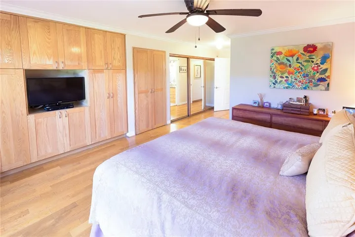 Primary Bedroom wall of built-ins
