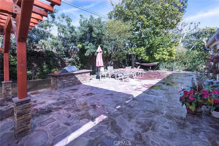 Another view of stone patio with barbecue station