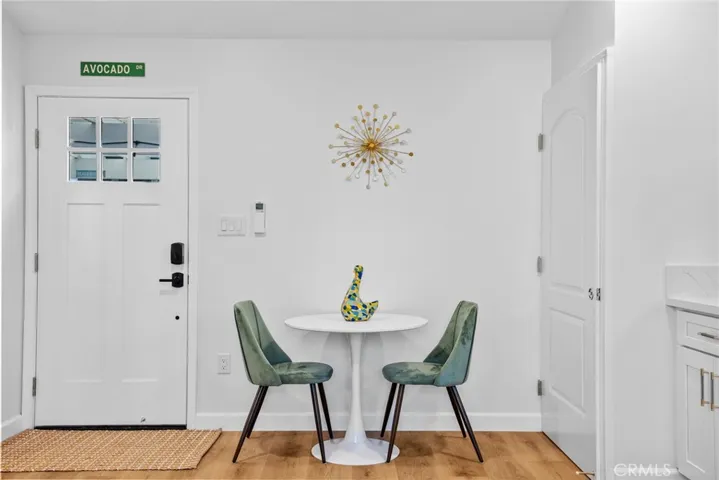 Private dining area inside unit. Wall remote to control 1 of 2 ceiling mounted mini split systems within unit.