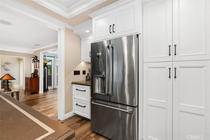 Refrigerators are included - ** Note SS Refridgerator also offer hot water,  Don't miss the two drawer drink refrigerator cabinets und the bar area.