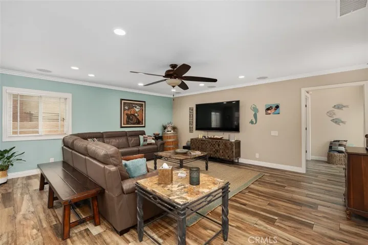 Recessed lighting, crown molding, surround sound, ceiling fan