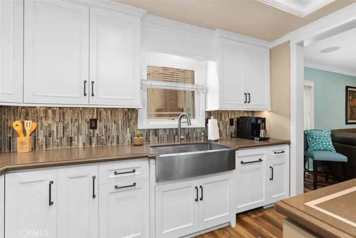 Large sink with window that opens out. 
