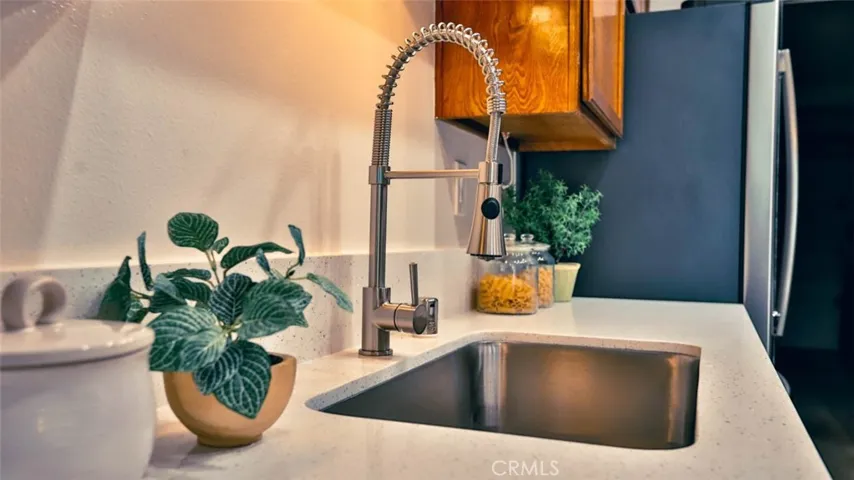 New sink, faucet, garbage disposal.