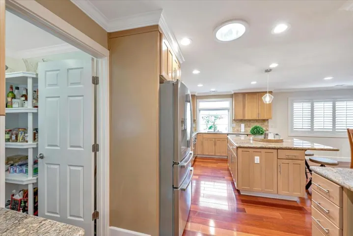 Large pantry near the front door for easy access.