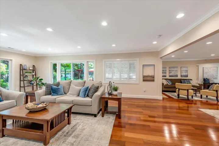 Large family room offers space for entertaining and relaxing and perfect access to the backyard.