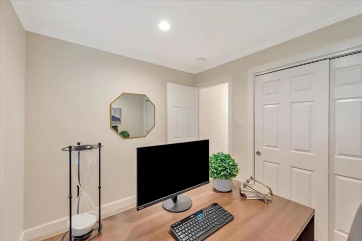 Bonus space with a closet. It is off the primary suite area.