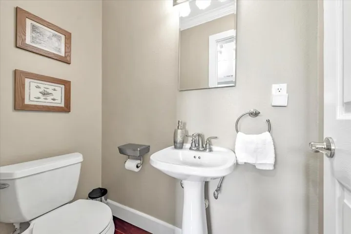 Half bath near the garage and laundry room.