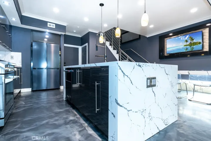 Island view toward included refrigerator