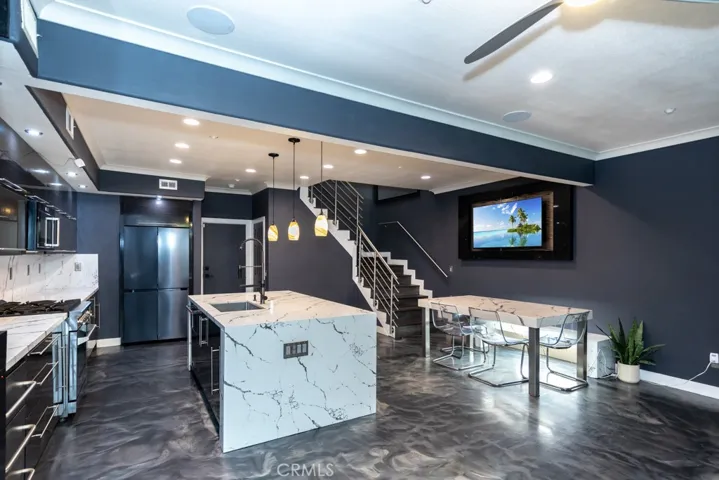 Loads of custom lighting, durable epoxy flooring