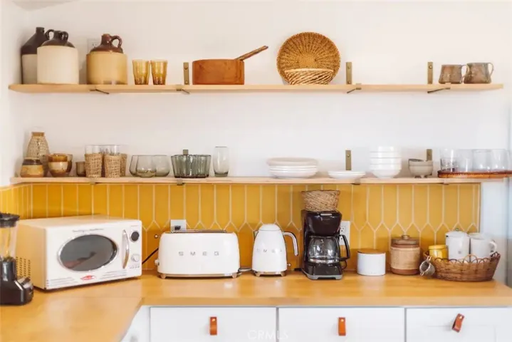 Plenty of counter space and open​​‌​​​​‌​​‌‌​​‌​​​‌‌​​​‌​​‌‌​​‌‌​​‌‌​​​​ shelving