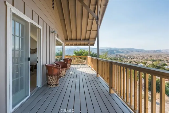 Wraparound deck with panoramic views of Pipes Canyon