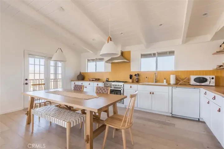 Open kitchen and dining area with view