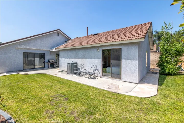 Large Sliders provide easy access to back yard from all parts of the House