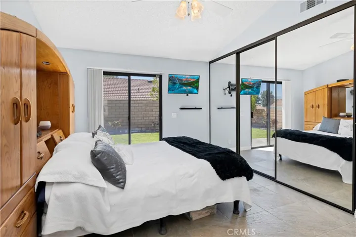 Master Bedroom with 3 Large Mirrored Closet Doors