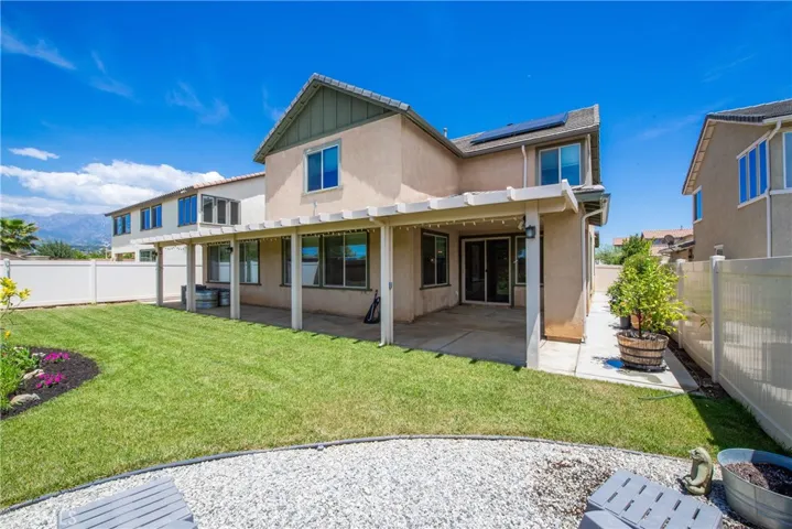 The backyard is fully landscaped with each side of the home fully cemented.