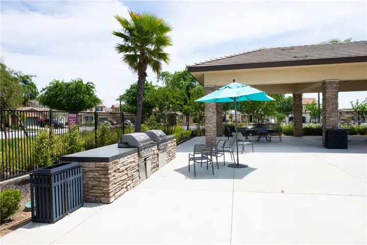 Enjoy a summer barbecue on the gas grills in the pool area.