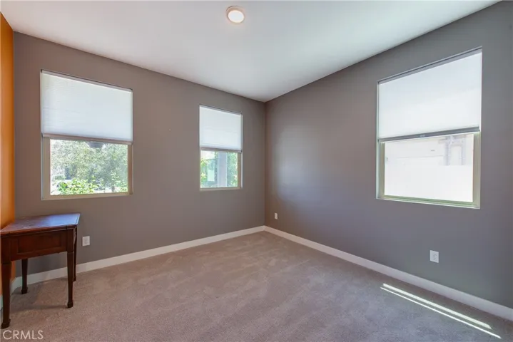 Bedroom 2 has several windows to let in the natural light.