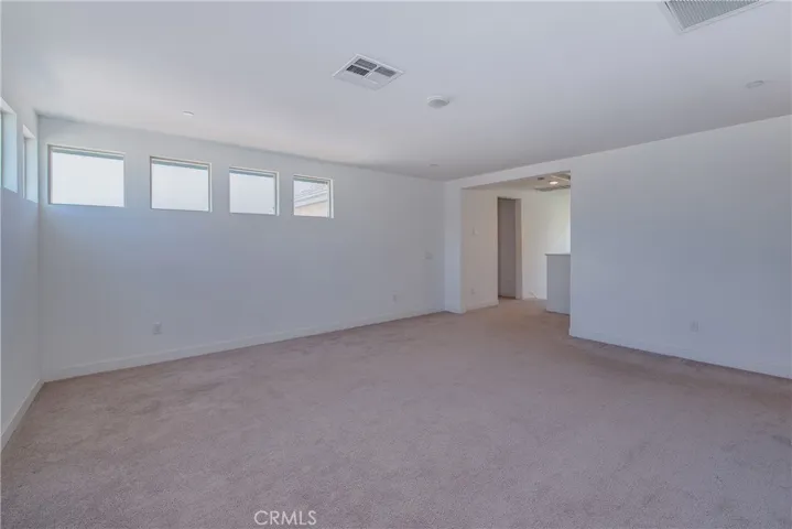 There are two whole house fans upstairs, one in the entrance to the loft the other in the loft to help keep the home cool.