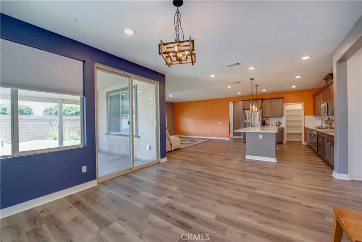 The roomy dining room opens into the kitchen.