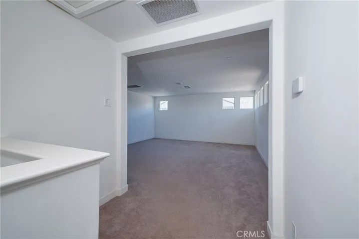 The loft at the top of the stairs has multiple high windows where you can take in the mountain view.