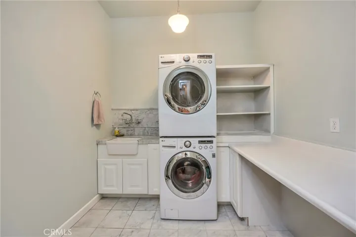 Huge laundry room with utility sink & folding shelf