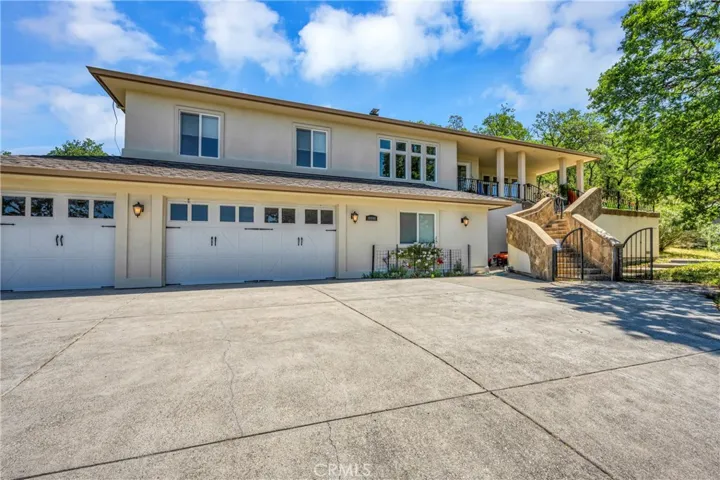 Three car garage with bonus living space downstairs