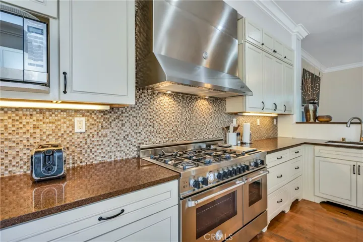 48" Range with double ovens & stainless hood