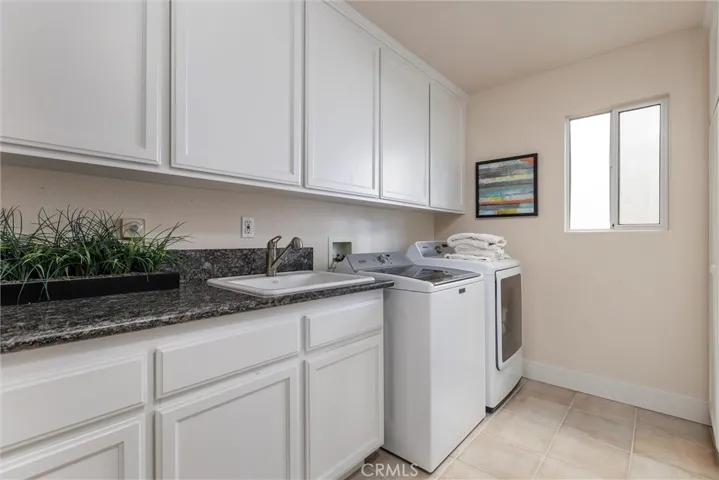 Laundry room full of cabinets