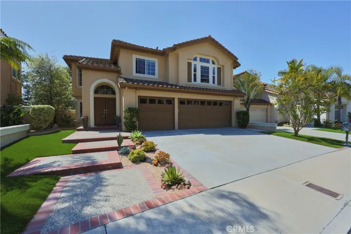 Move-in ready 4/5 bedroom home with 3 car garage on a view lot.