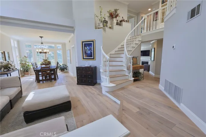 Upgraded wood floors throughout main level and stairs