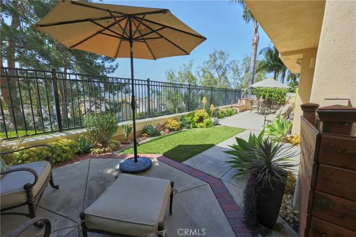 Enjoy the easy care backyard with turf and succulents.