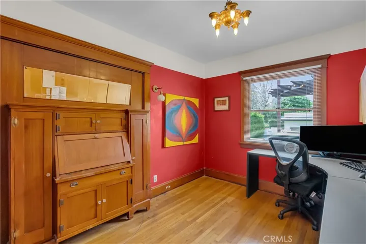 Downstairs bedroom with secretary desk that pivots around to expose the original Murphy bed.