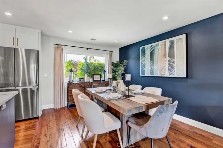 Dining Room With Window Overlooking Backyard