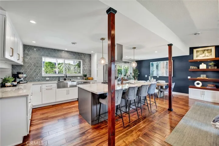 Custom Self-Closing White Shaker Cabinetry, paired with Stainless Appliances