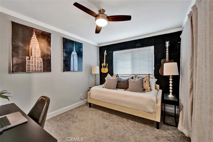 Downstairs Bedroom With Ceiling Fan