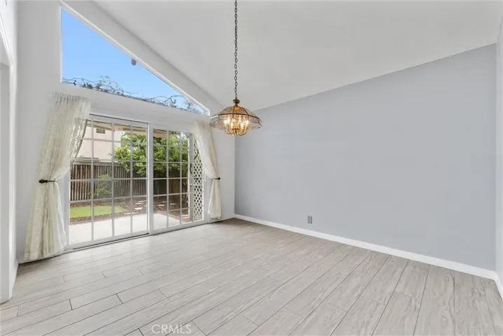 Formal Dining Room with Vaulted Ceiling