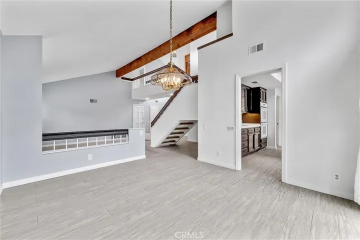 Formal Dining Room with Vaulted Ceiling