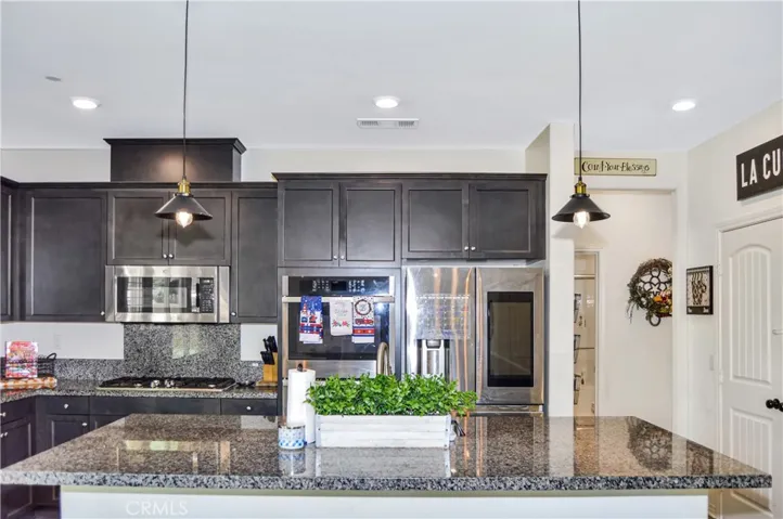 The breakfast bar is a great spot to perch and chat with the chef