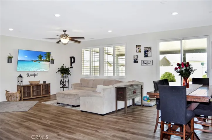 Let's start with the living room portion of the great room. Did you notice that waterproof luxury vinyl plank flooring?