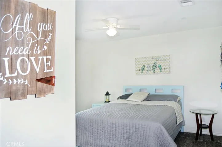 The 4th bedroom is right across from Bedroom #3 and offers nice views of the local hills to the south, a walk-in closet, a ceiling fan, and window blinds