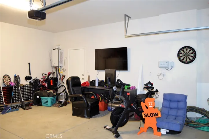 2-car garage with access to the backyard on the side