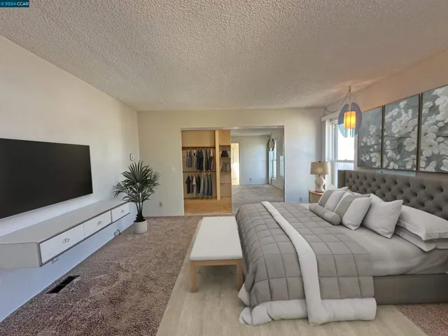 virtually staged main bedroom