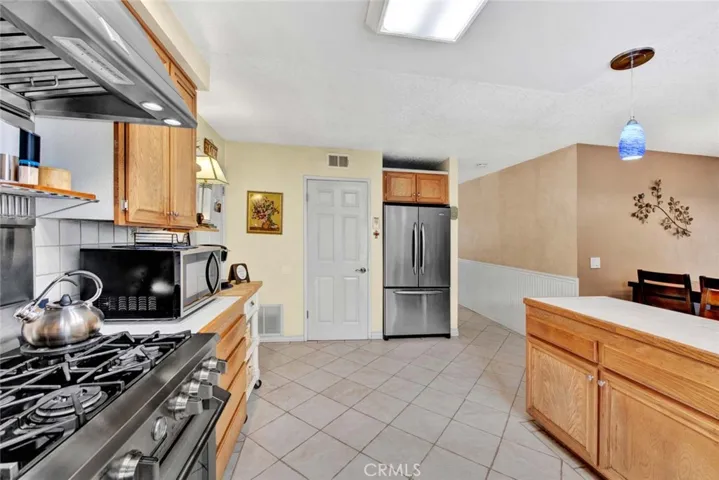 Tile flooring and pantry.