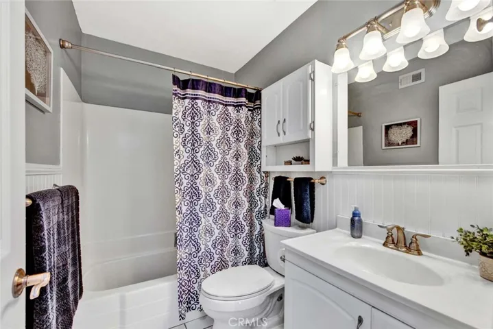 Tile flooring and newer vanity.