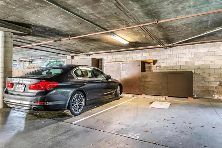  two parking spaces assigned and signed Storage area