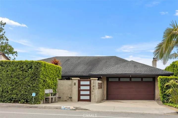 Front of the home showing front gate.