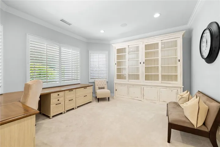 Office/library that could easily be converted into a fourth bedroom.