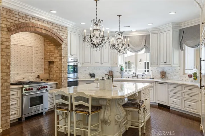 Center island with double chandeliers.